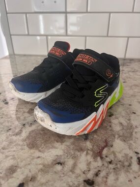 Skechers Kids Black and Blue Light-Up Glow Bolt Sneakers